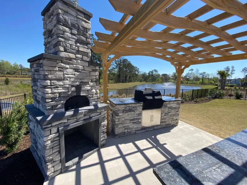 Outdoor brick kitchen by Dawson's Quality Home Services