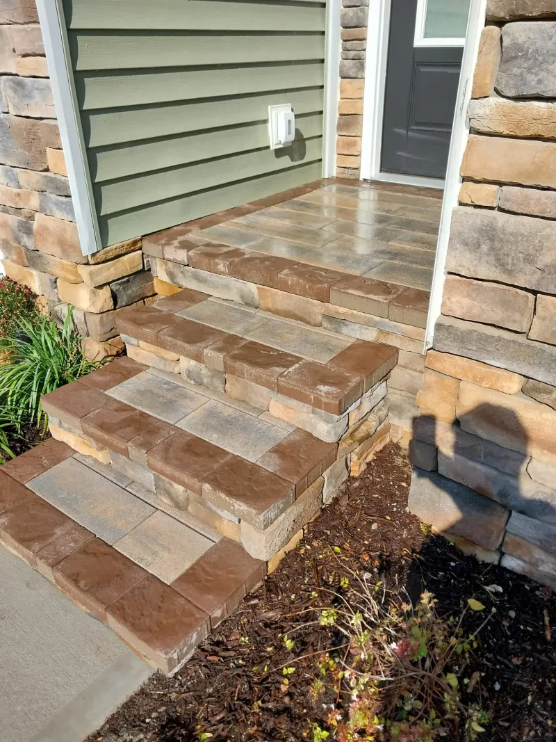 Brick steps and patio by Dawson's Quality Home Services