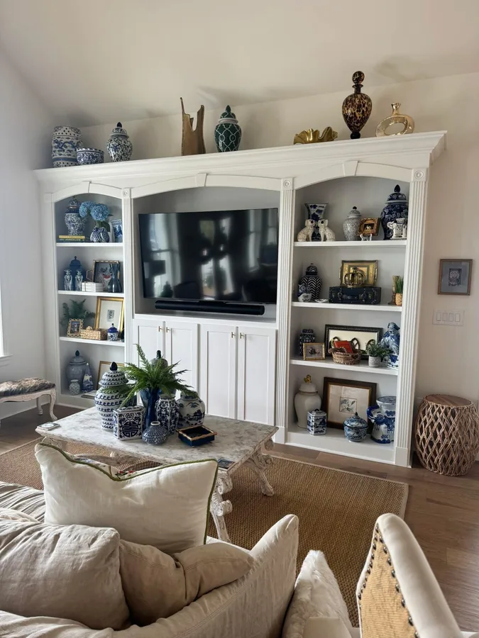 Living room with custom built-in shelving and cabinetry