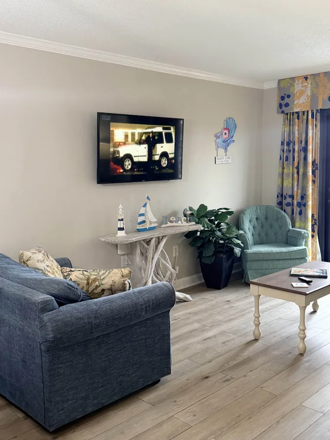 Renovated living room with new flooring